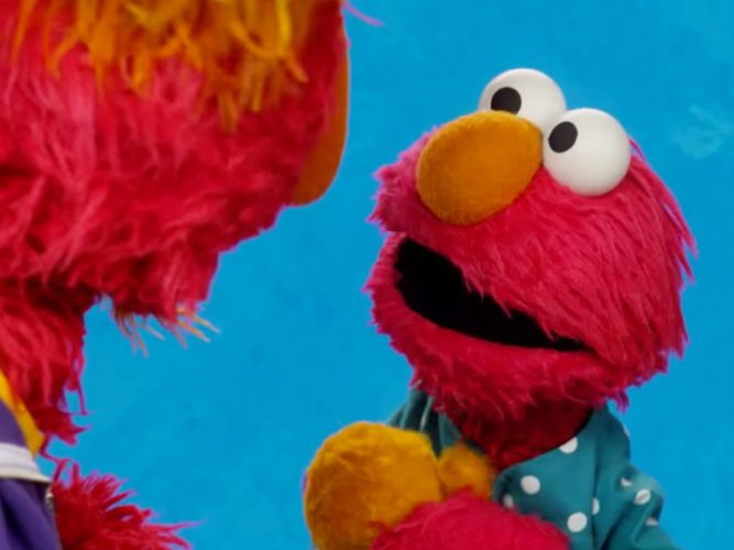 Elmo speaks to Louie