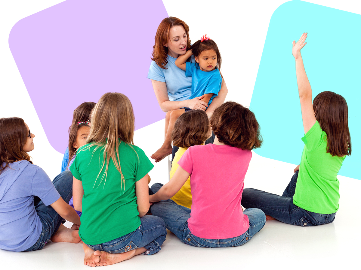 A teacher speaks to their class of students