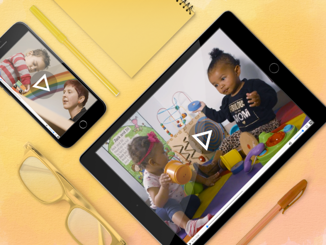 Video on tablet with toddlers playing.