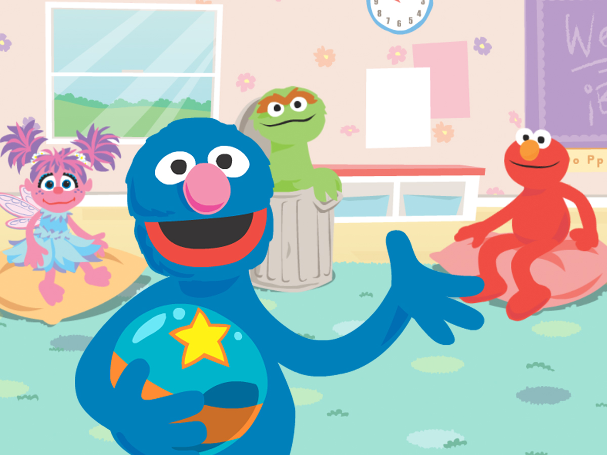 Grover, Elmo, Abby and Oscar in a classroom.
