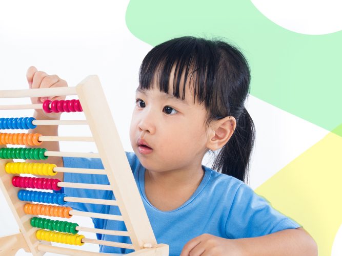 Little girls using an abacus.