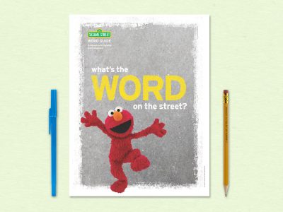 Elmo poses excitedly under the title What's the Word on the Street