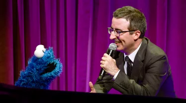 John Oliver and Cookie Monster.