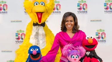 Michelle Obama, Big Bird, Grover, Abby and Elmo.