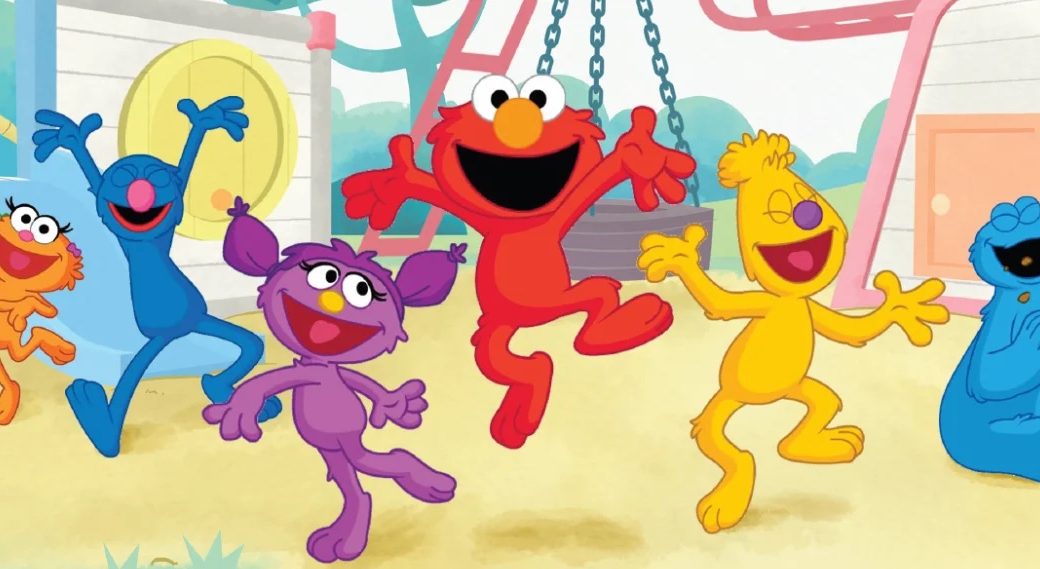 Elmo jumps joyously on the playground as other muppets look on.