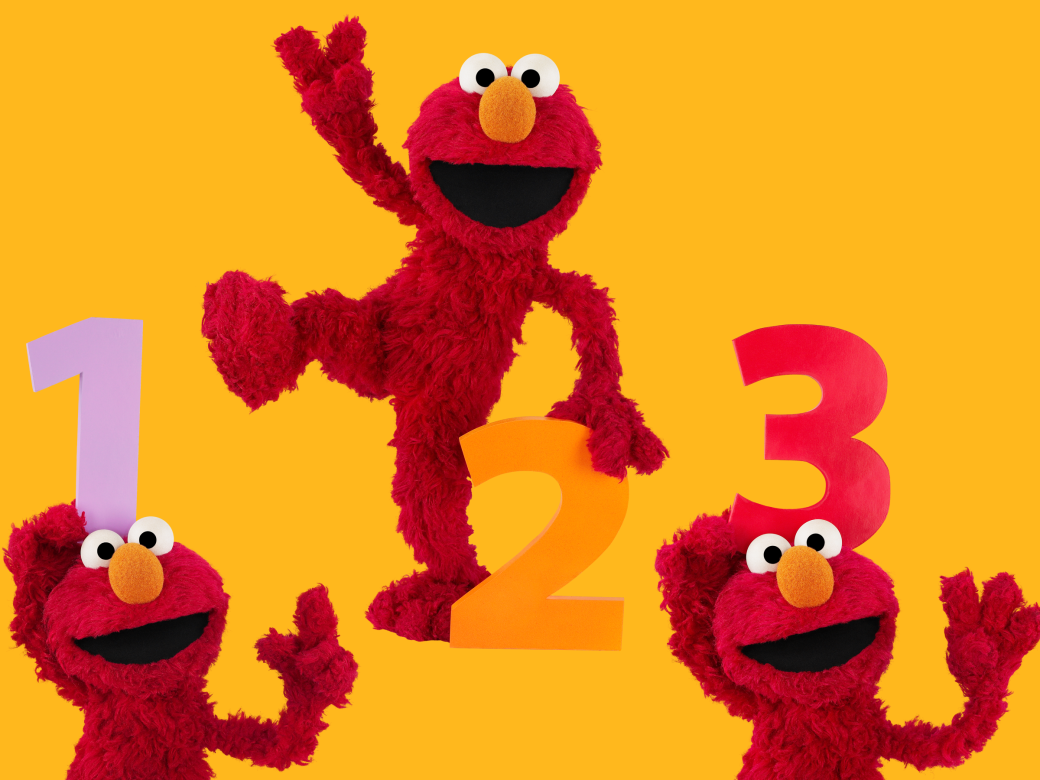 Elmo dancing with numbers.