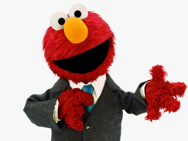 Elmo in a suit.