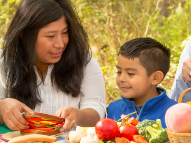 Rosita at a picnic with a family