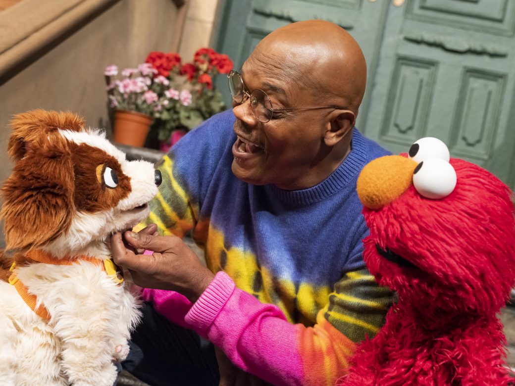 Samuel L. Jackson pets Tango with Elmo