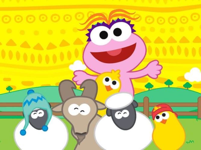 Lola is surrounded by farm animals wearing hats.