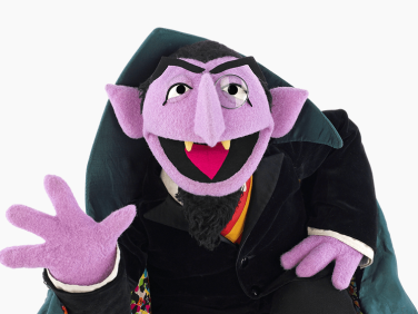 The Count waving