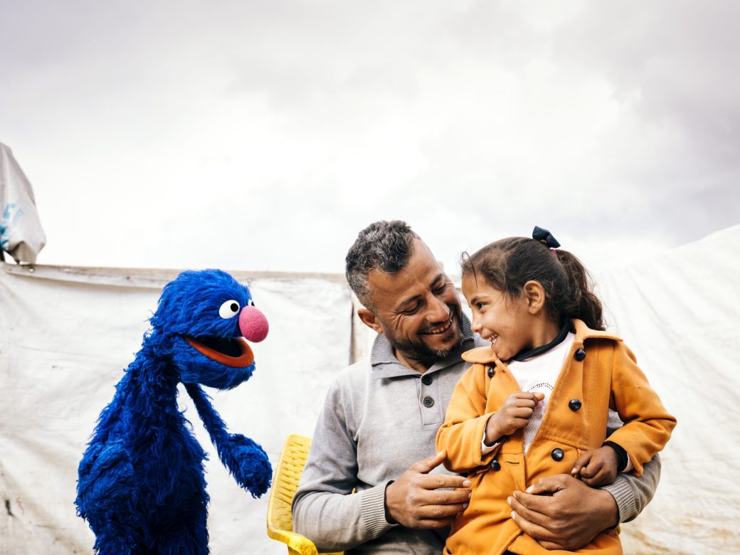 Grover and a family.