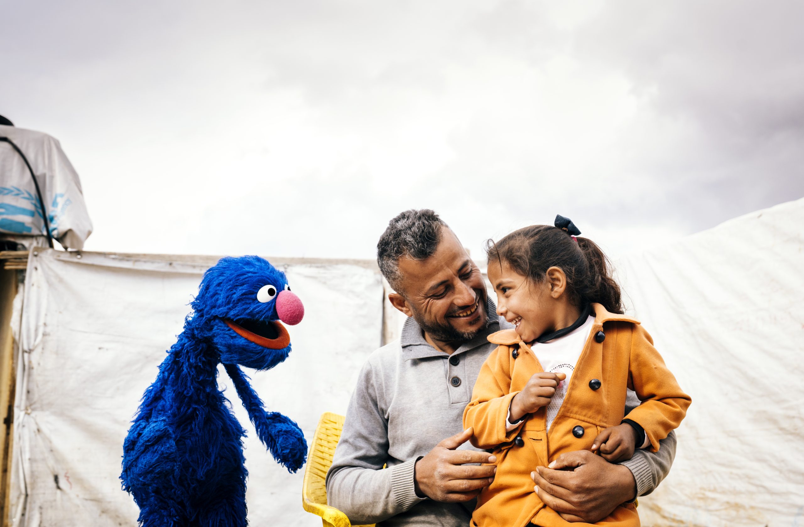 Grover and a family.
