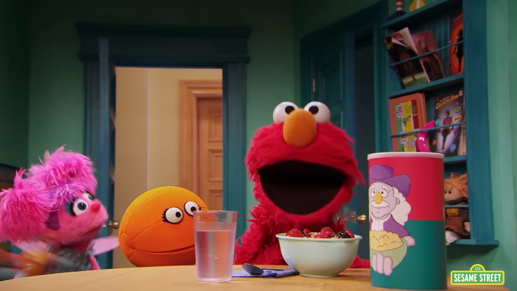 Elmo and Abby having oatmeal.