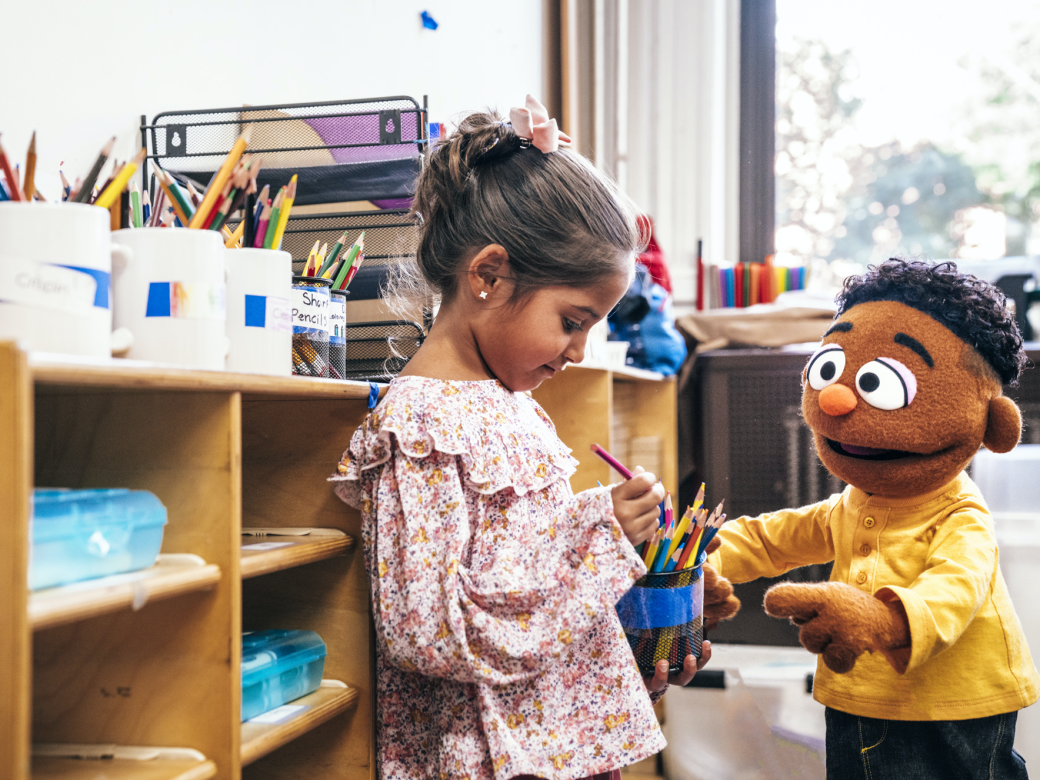 Wes and a child at the library.