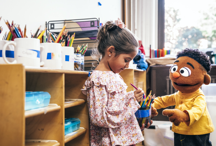 Wes and a child at the library.