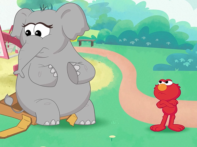 Elmo looking at an elephant.