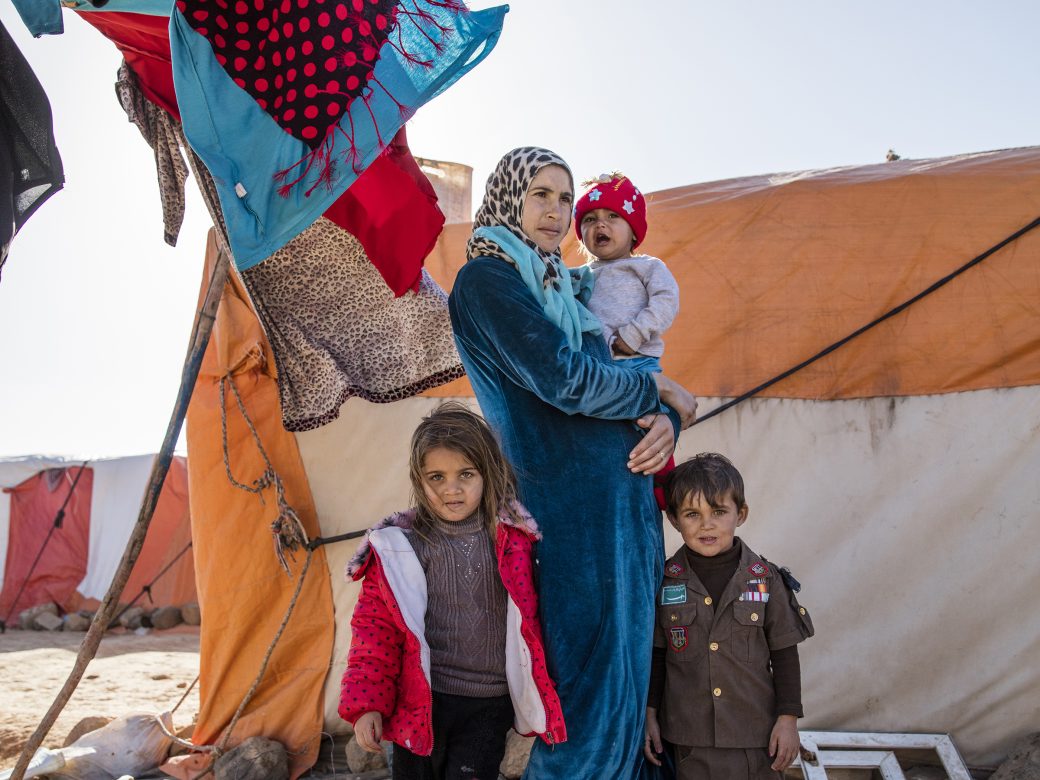 A family at a refugee camp.