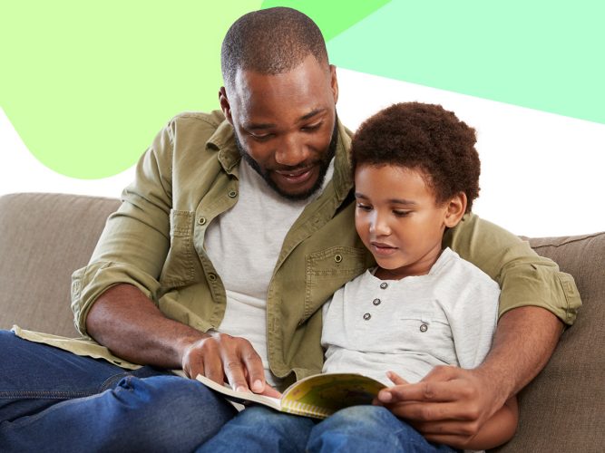 A parent and their child read a book together.