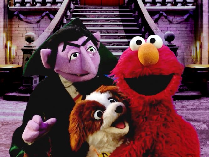 The Count poses with Elmo and Tango