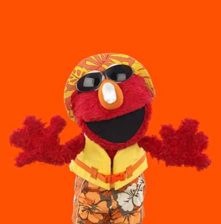 Elmo with sunscreen and summer outfit