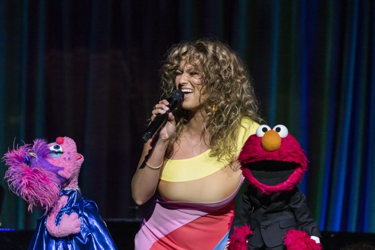 Tori Kelly singing with Abby Cadabby and Elmo