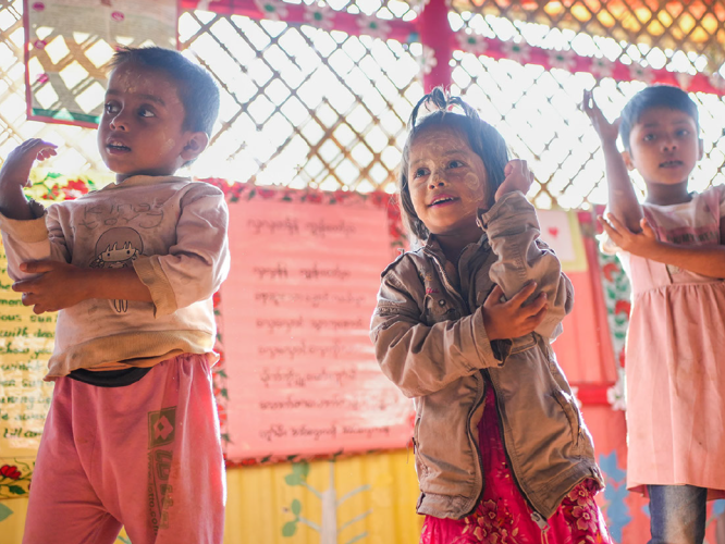 Three children playing.