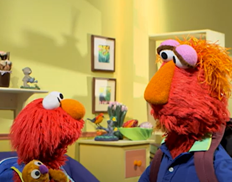 Elmo and Louie having a conversation