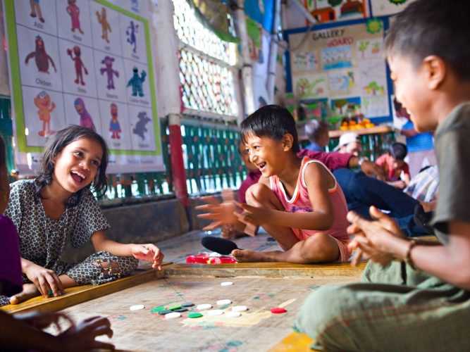 Children playing in a classroom in Cox's Bazar.