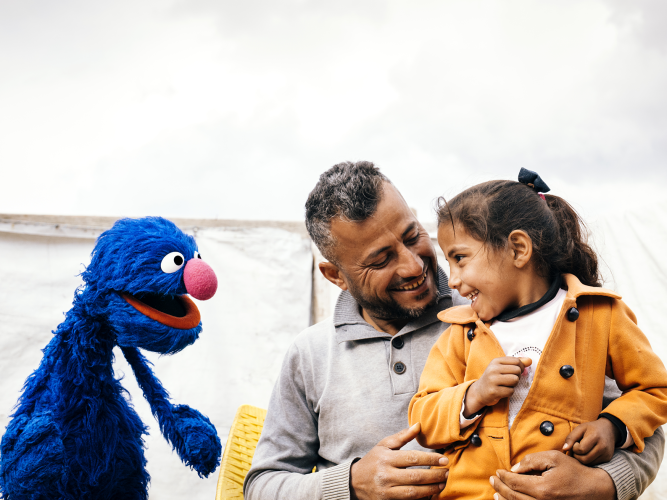 Grover and a family.