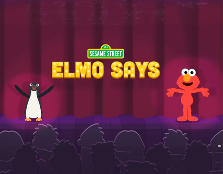 Elmo Says sign with Elmo.