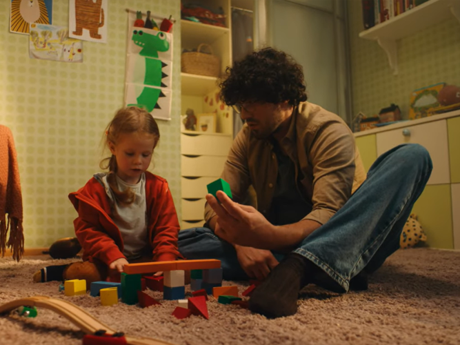 Parent playing blocks with child