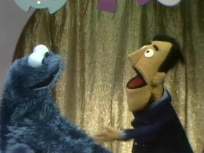 Cookie Monster and Guy Smiley.