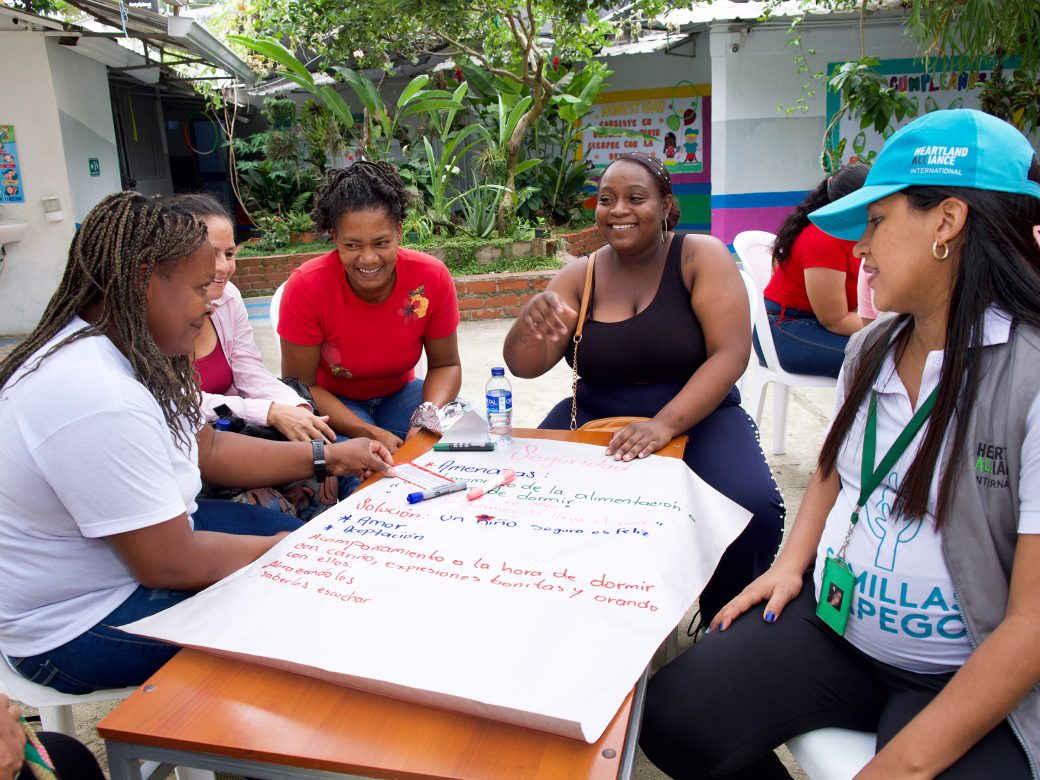 A group of providers writing.