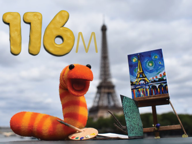 Slimey in Paris in front of the Eiffel tower and the number 116M.