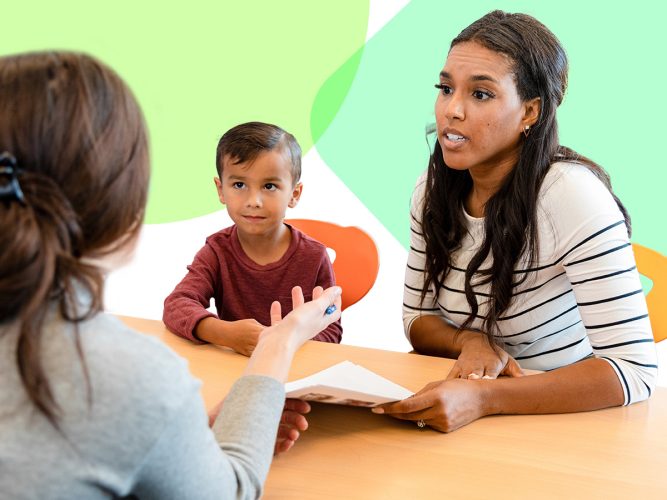 Two adults talking with a child.