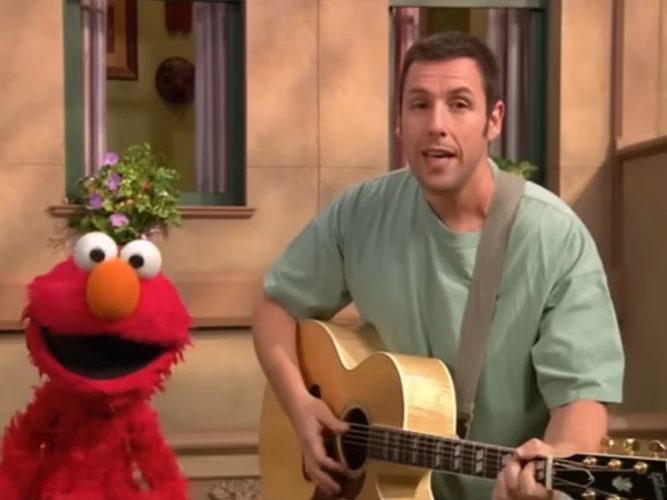 Adam Sandler and Elmo.