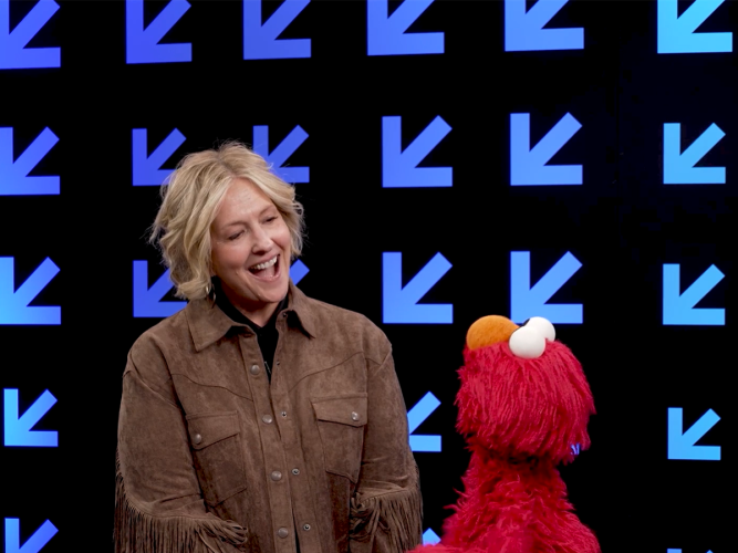 Elmo and his friend Brené Brown talking.