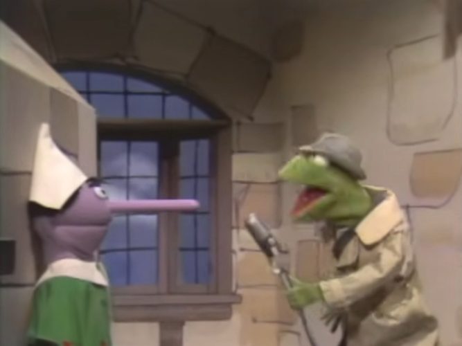 Pinocchio's talking to reporter Kermit.