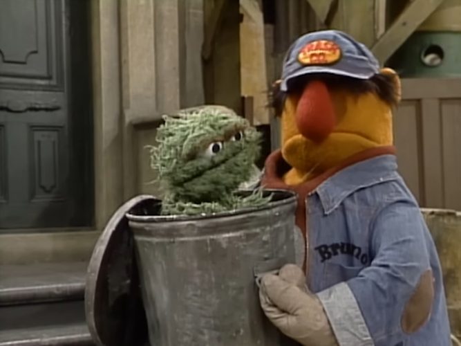 Oscar the grouch and a garbage man.