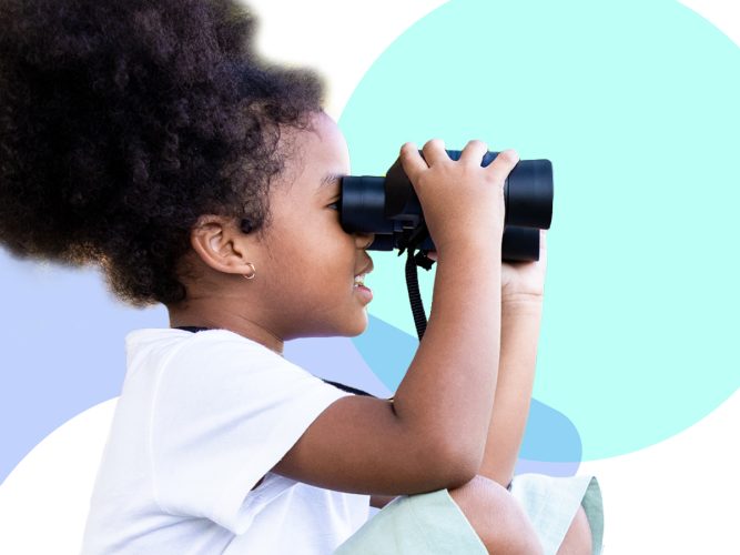 A child using binoculars