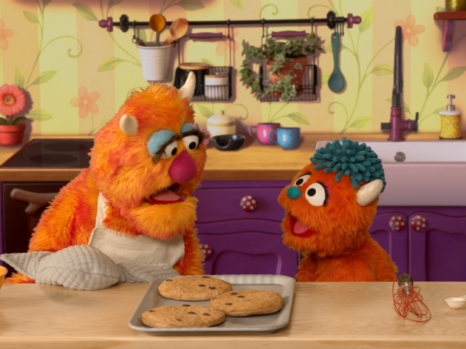 Rudy and Freddie baking cookies.