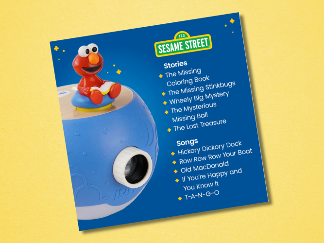 Elmo reading a book