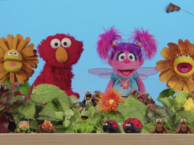 Elmo, Abby and a bunch of backyard bugs.