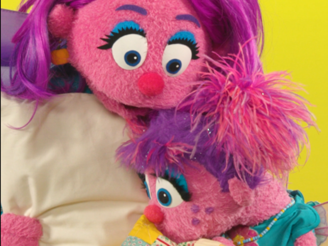 Abby and Maggie Cadabby hugging.