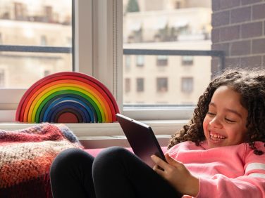 Parent and child on tablet