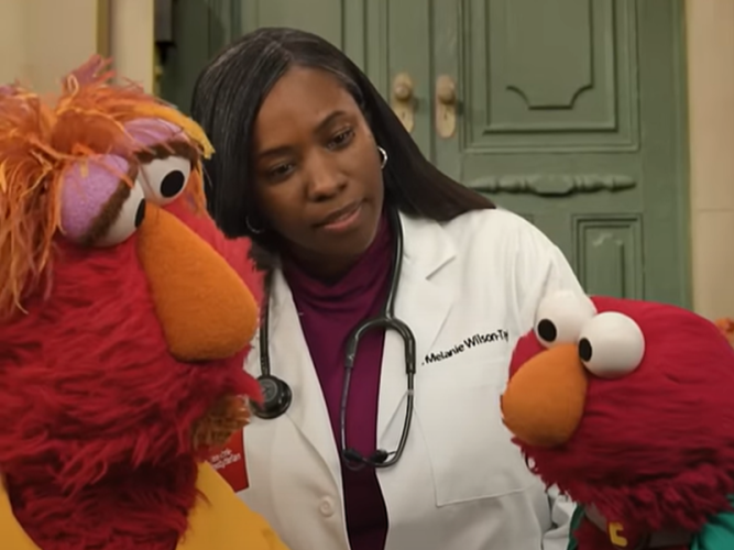 Louie, Elmo and a doctor.