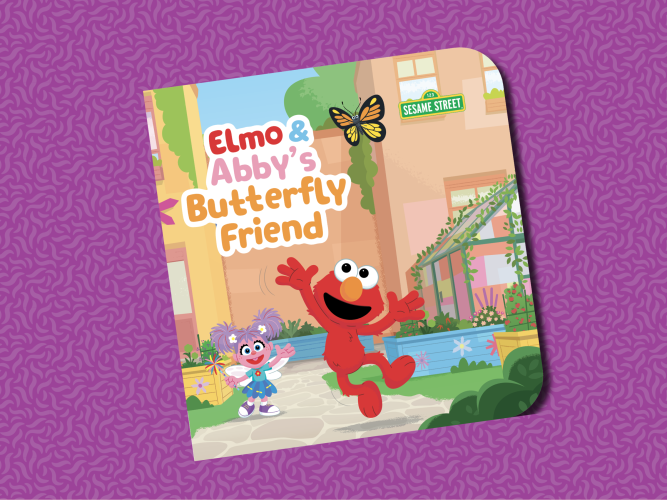 Abby and Elmo with a butterfly