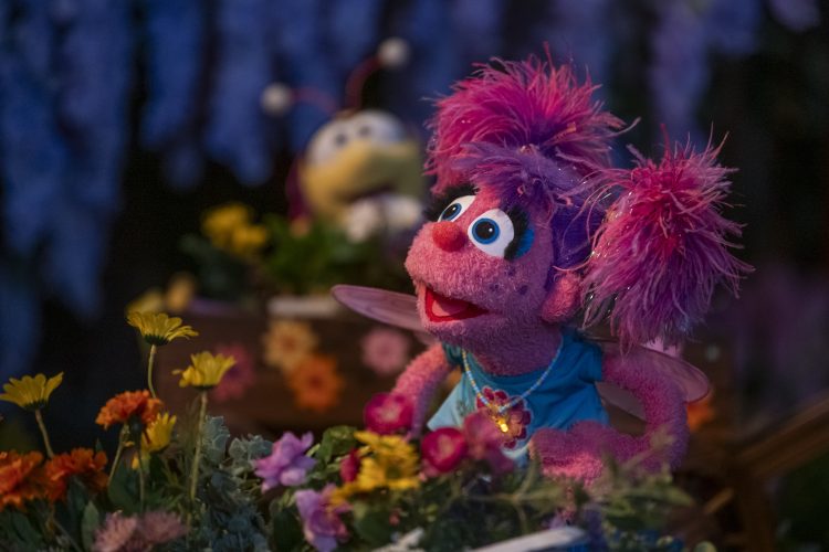 Abby in her garden at night.