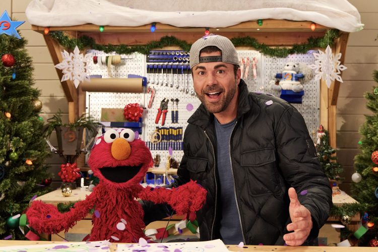Mark Rober and Elmo.